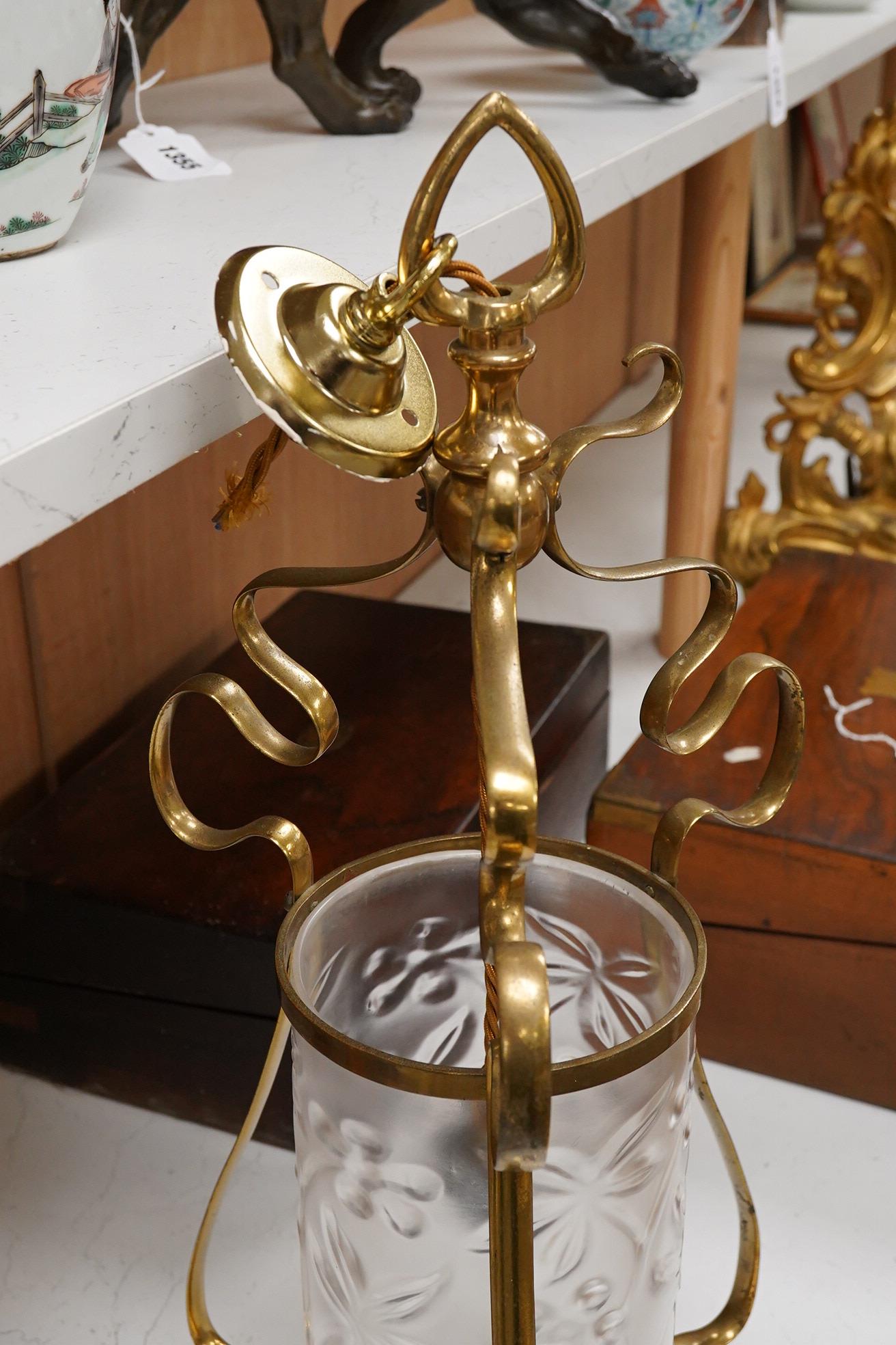 An Art Nouveau frosted glass and a brass hanging lamp, 54cm